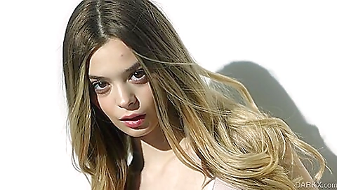 Sexy blonde model shows off her ass