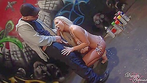 Sexy blonde model shows off her tight pussy